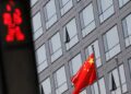 Protests Erupt at Two Chinese Factories Over Pay Cuts and Job Security Concerns